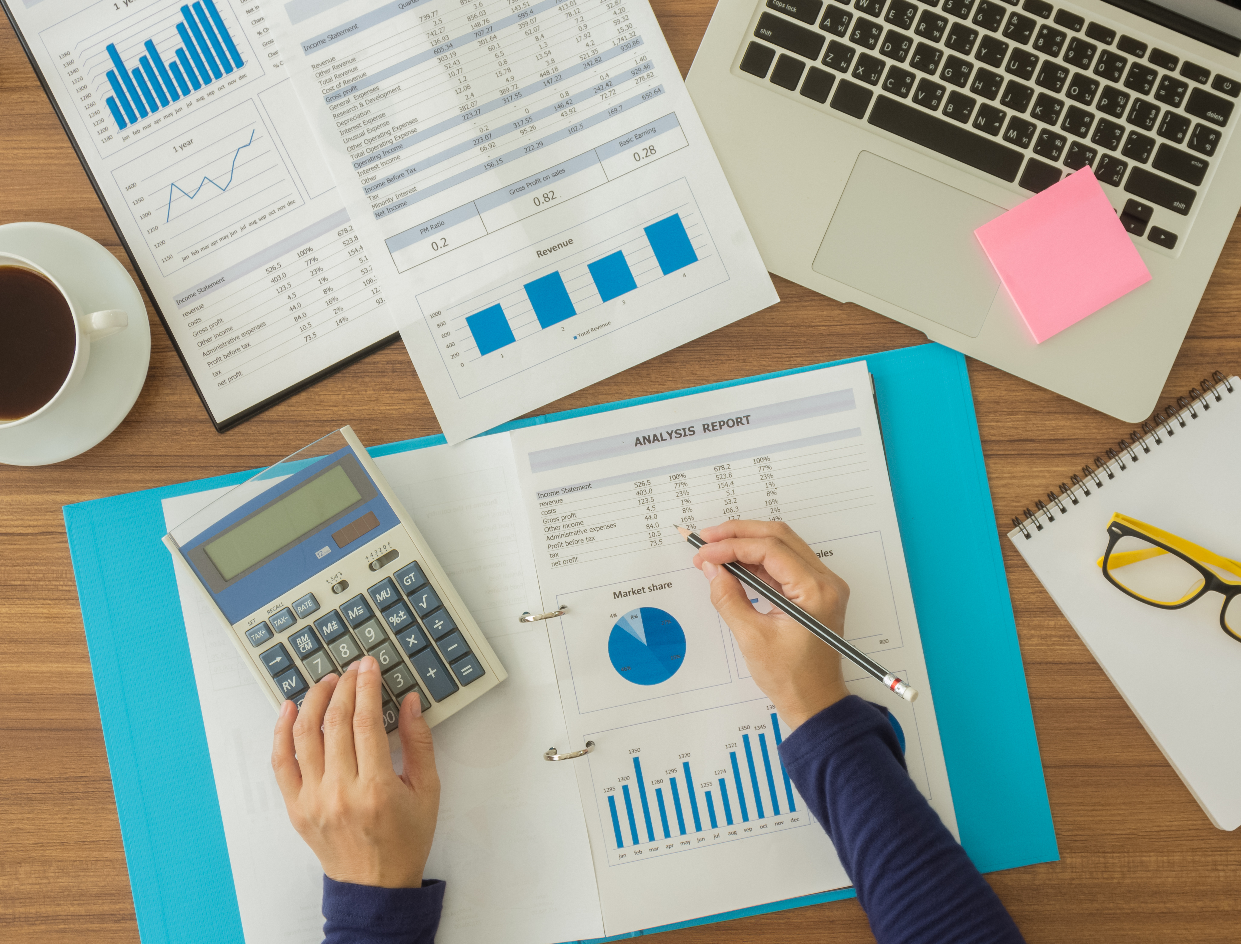 Accountants are working to analyze company data. top view. Accounting Concept.